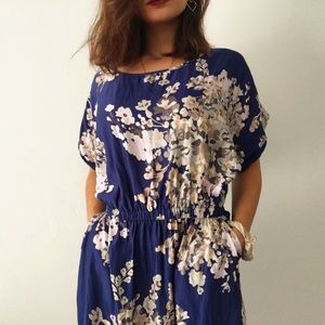 blue and white floral dress with pockets.